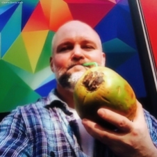 Mark Wallis drinking coconut milk in London on thevibes.me
